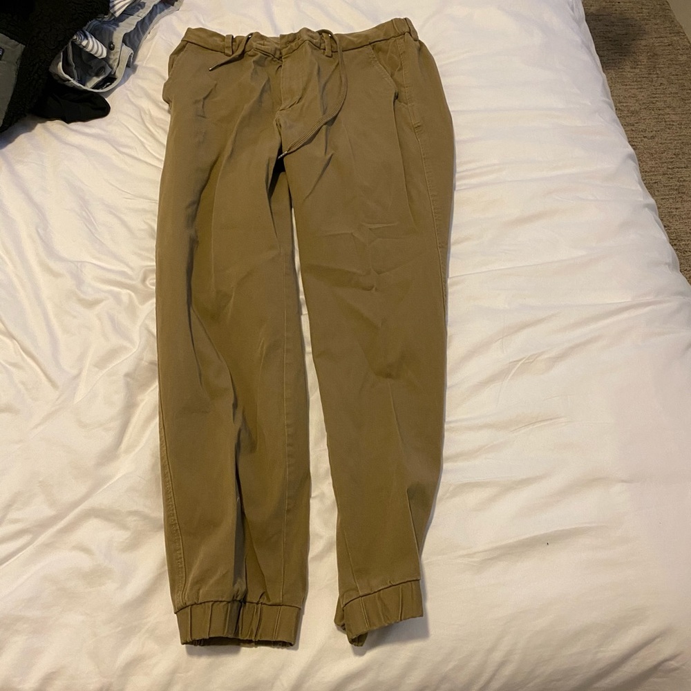 Light brown/tan Uniqlo jogger-style chino pants